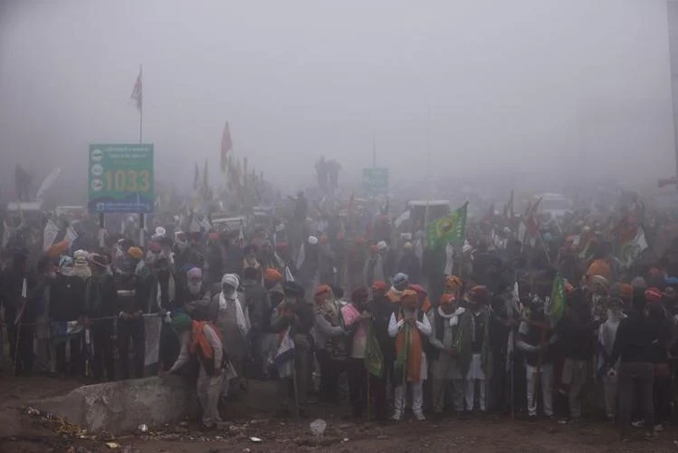 Police fire tear gas on Indian farmers marching to capital, govt offers talks